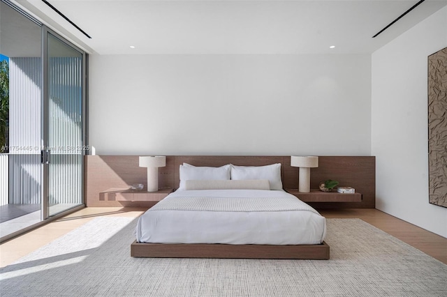 6800 SW 83rd Pl, Miami, FL 33143 - bedroom featuring access to exterior and wood finished floors