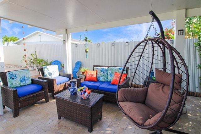 view of patio featuring a fenced backyard and an outdoor living space