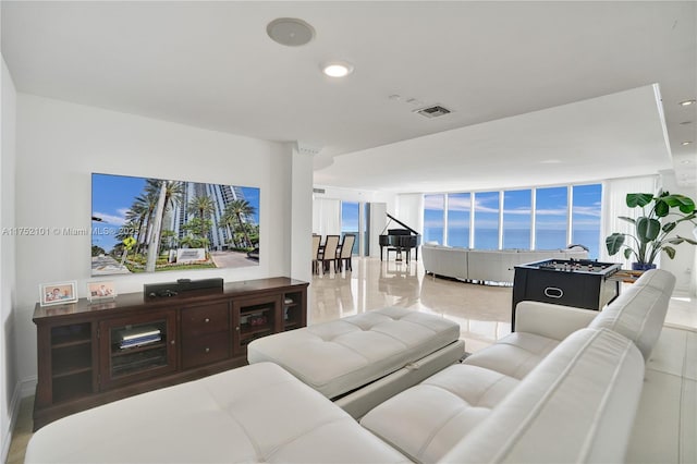 living room with visible vents and recessed lighting