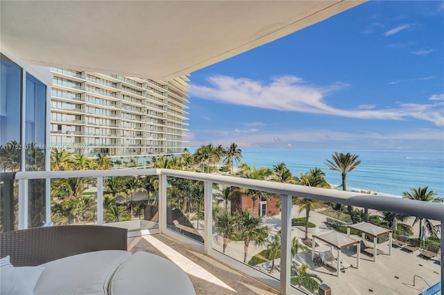 balcony featuring a water view