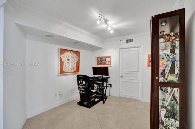 sitting room featuring ornamental molding, visible vents, baseboards, and light tile patterned floors