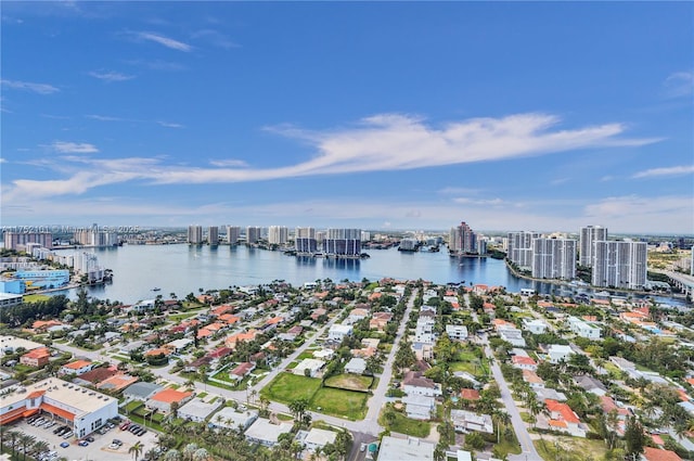 aerial view with a city view and a water view