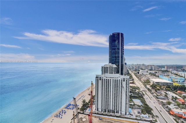 aerial view with a water view and a city view