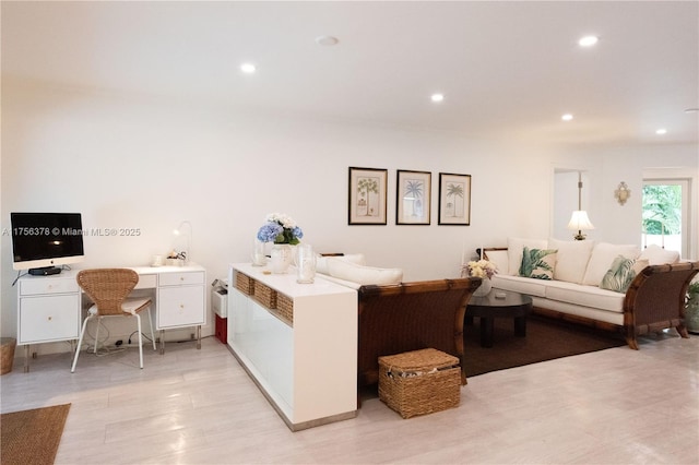 living room featuring recessed lighting