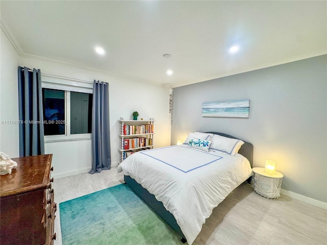 bedroom featuring recessed lighting, crown molding, baseboards, and wood finished floors