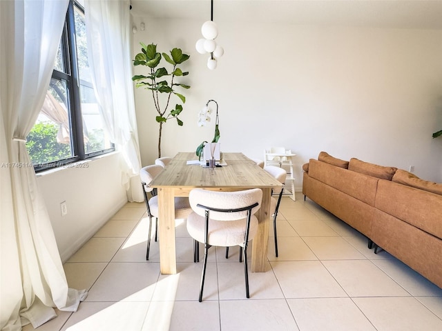 686 NE 191st Ter, Miami, FL 33179 - dining room with light tile patterned floors