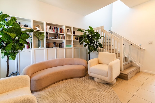 686 NE 191st Ter, Miami, FL 33179 - living area with tile patterned floors and stairway