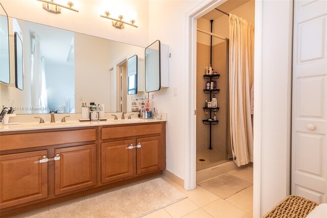 686 NE 191st Ter, Miami, FL 33179 - full bathroom with a shower stall, tile patterned flooring, and double vanity