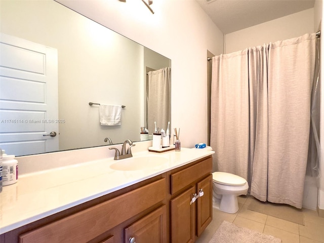 686 NE 191st Ter, Miami, FL 33179 - full bathroom with tile patterned flooring, vanity, and toilet