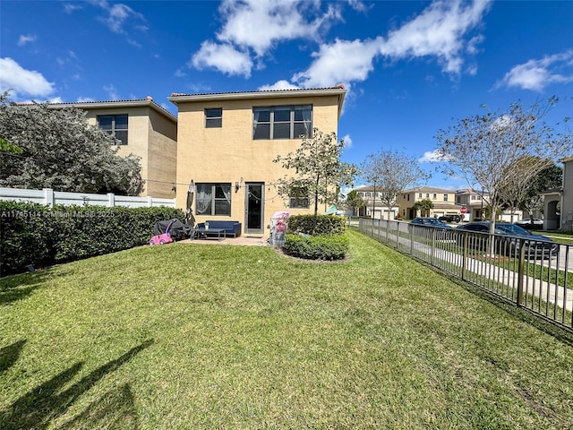 686 NE 191st Ter, Miami, FL 33179 - rear view of property with stucco siding and a residential view