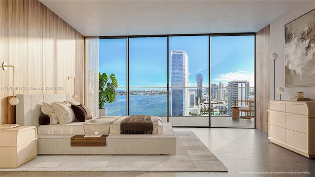 bedroom featuring a view of city and a wall of windows