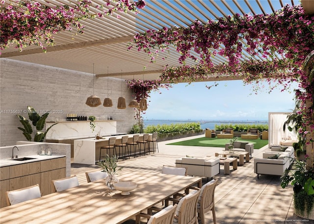 view of patio featuring a sink, outdoor dining area, an outdoor hangout area, and a pergola