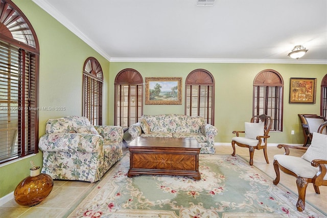 tiled living room featuring baseboards and crown molding