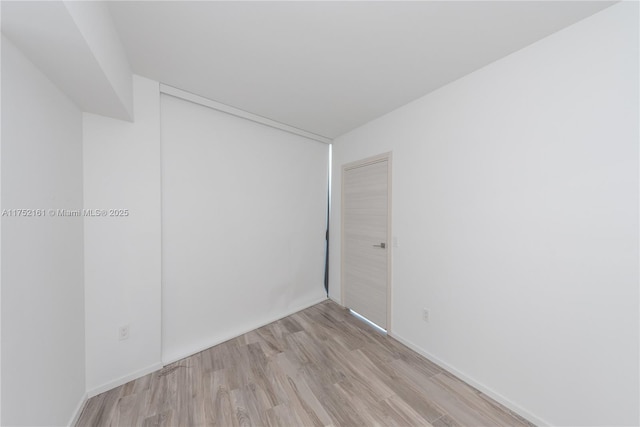 empty room featuring light wood-type flooring