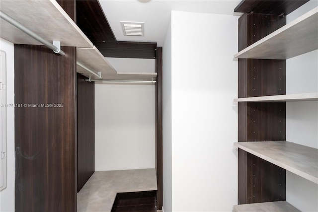 walk in closet featuring visible vents