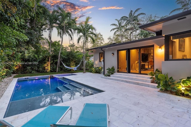 pool featuring a patio