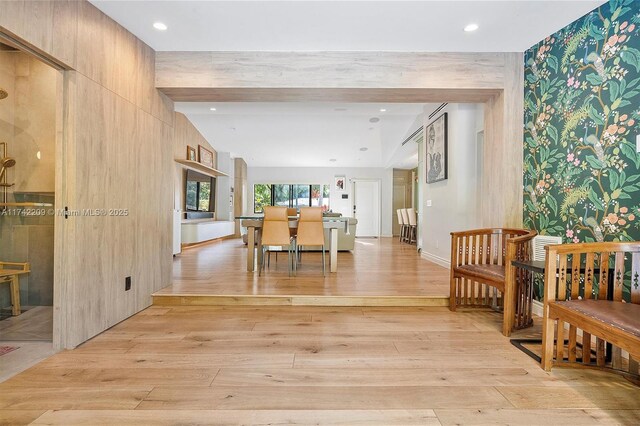 dining area featuring lofted ceiling with beams, baseboards, light wood-style flooring, and recessed lighting