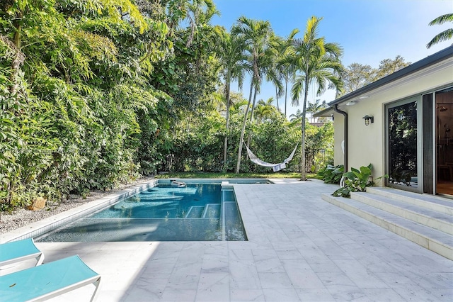 pool featuring a patio