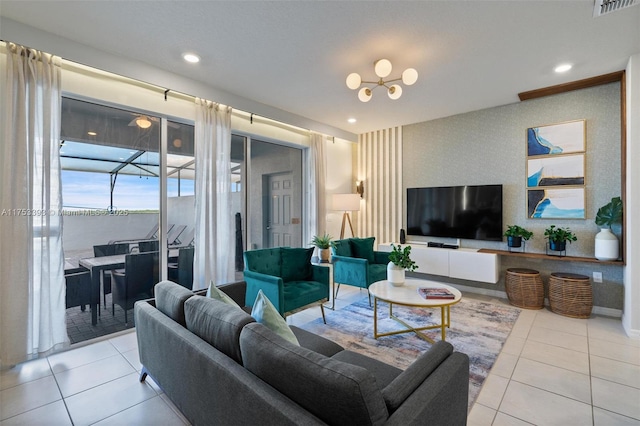 living area featuring tile patterned flooring, visible vents, recessed lighting, and wallpapered walls