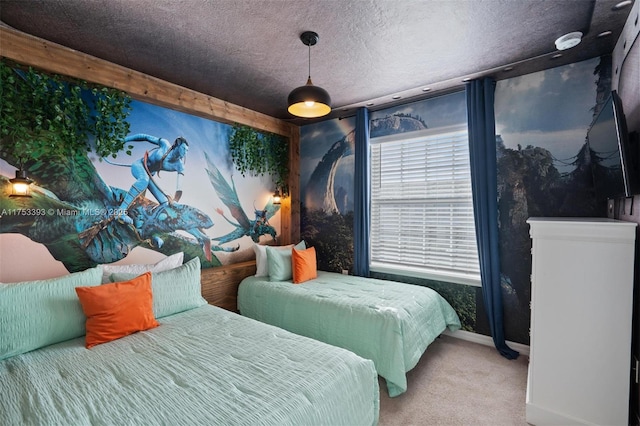 carpeted bedroom featuring baseboards and a textured ceiling