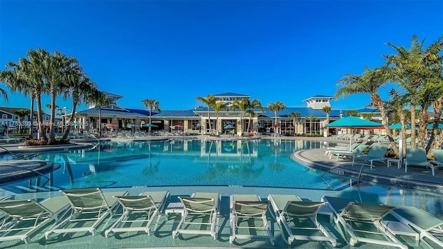 community pool featuring a patio area