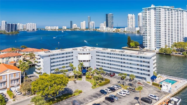 bird's eye view with a view of city and a water view