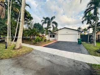 view of front of home featuring driveway and an attached garage