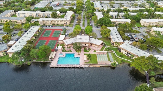 birds eye view of property featuring a water view