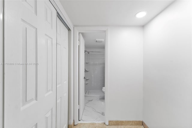 300 Berkley Rd Unit 107, Hollywood, FL 33024 - corridor with light marble finish floors and baseboards
