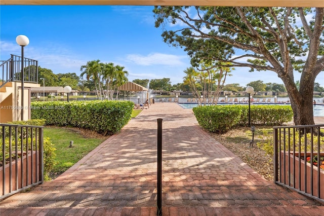 300 Berkley Rd Unit 107, Hollywood, FL 33024 - view of property's community featuring a swimming pool
