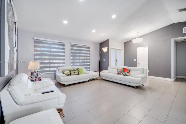 living area with recessed lighting, visible vents, baseboards, and vaulted ceiling