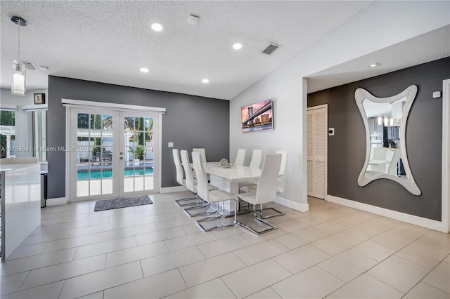 dining area featuring visible vents, french doors, and baseboards