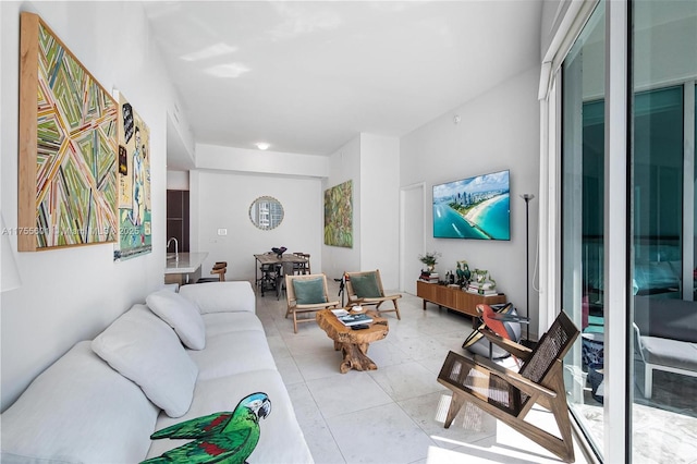 living area with light tile patterned flooring