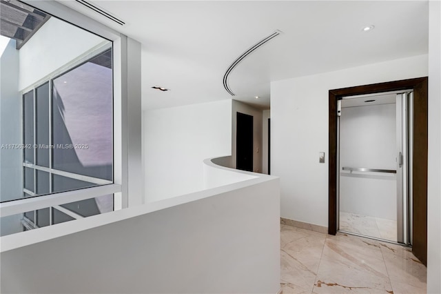 548 Fernwood Rd Unit 548, Key Biscayne, FL 33149 - corridor featuring recessed lighting and marble finish floor