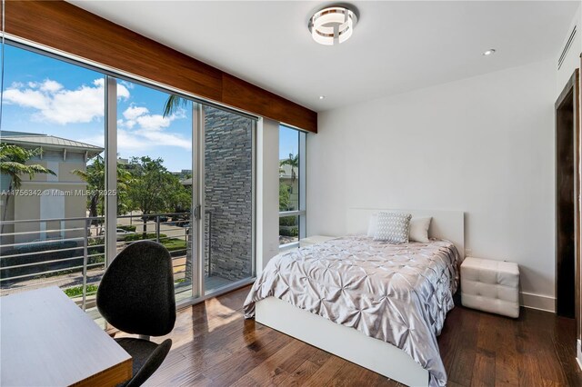 548 Fernwood Rd Unit 548, Key Biscayne, FL 33149 - bedroom featuring recessed lighting, access to exterior, and wood finished floors