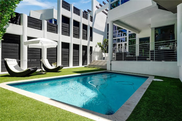 548 Fernwood Rd Unit 548, Key Biscayne, FL 33149 - outdoor pool featuring a lawn