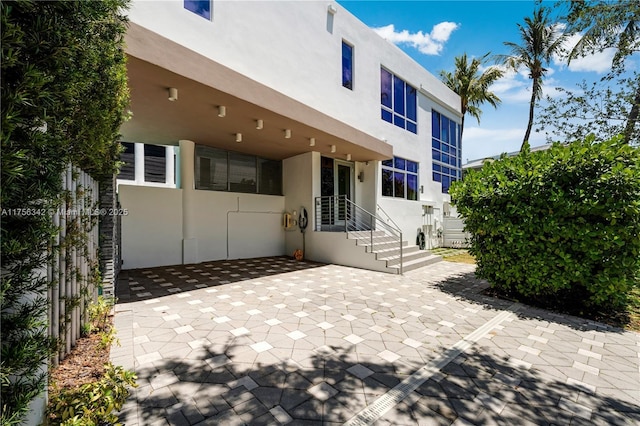 548 Fernwood Rd Unit 548, Key Biscayne, FL 33149 - rear view of property with stucco siding