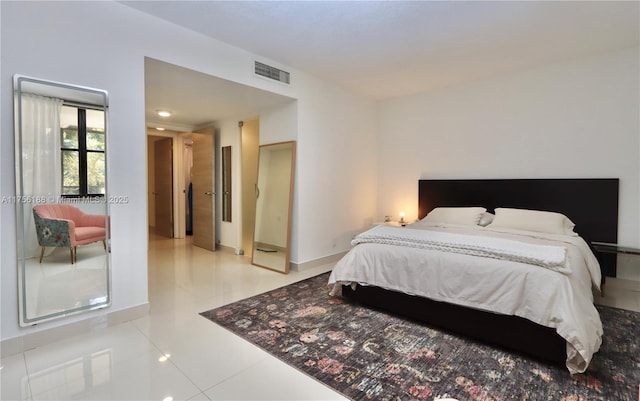 20350 W Country Club Dr Unit 104-4, Aventura, FL 33180 - tiled bedroom featuring baseboards