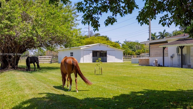 1970 SW 115th Ave, Davie, FL 33325 - view of yard with fence, an outbuilding, and a pole building