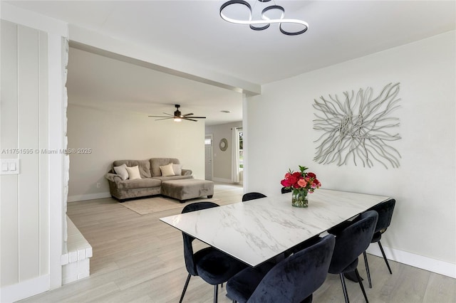 1970 SW 115th Ave, Davie, FL 33325 - dining room with baseboards, an inviting chandelier, and light wood finished floors