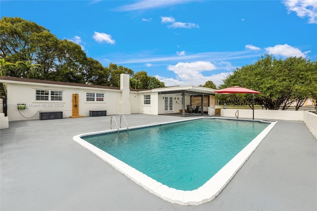 1970 SW 115th Ave, Davie, FL 33325 - pool with a patio and french doors