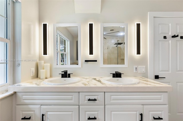 1970 SW 115th Ave, Davie, FL 33325 - bathroom with double vanity, a tile shower, and a sink