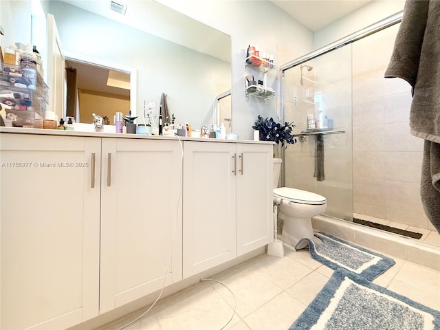 full bath featuring toilet, a stall shower, visible vents, and tile patterned floors