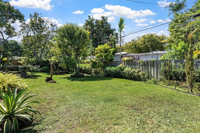 view of yard with fence