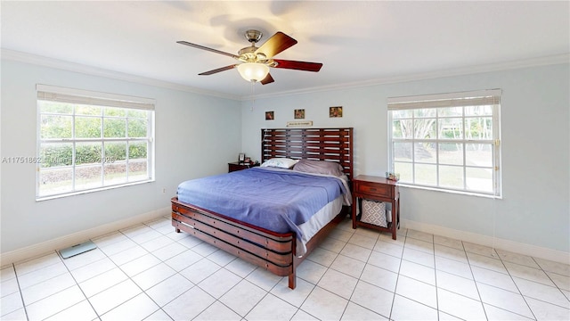 bedroom featuring light tile patterned floors, ornamental molding, and multiple windows