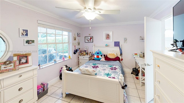 bedroom with baseboards, light tile patterned flooring, a ceiling fan, and crown molding