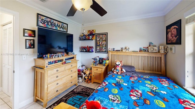 bedroom featuring ceiling fan, ornamental molding, and tile patterned flooring