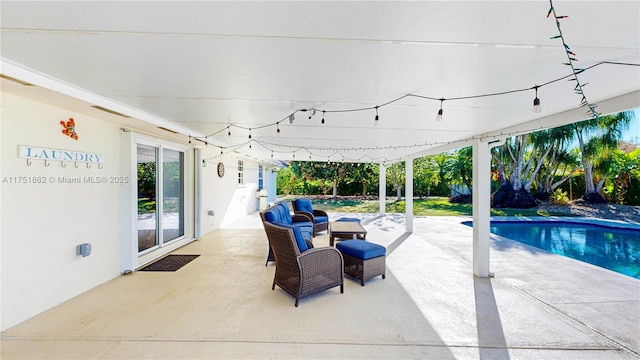 view of patio / terrace with an outdoor pool