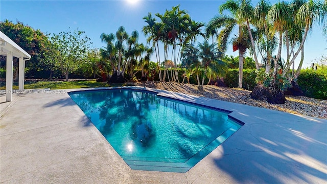 pool with a patio