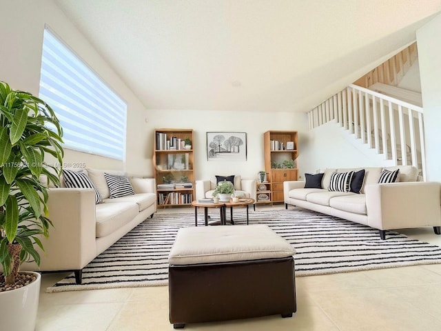 tiled living area with stairs